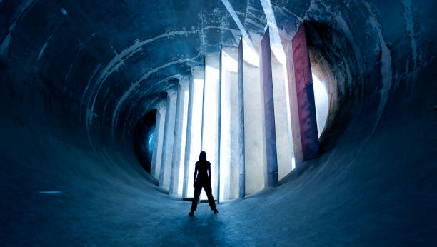 istock young woman standing in futuristic building 155446718