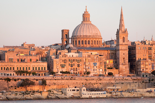 Beautiful shot of Valletta, the capital city of Malta. Seen in soft warm light at sunset. 