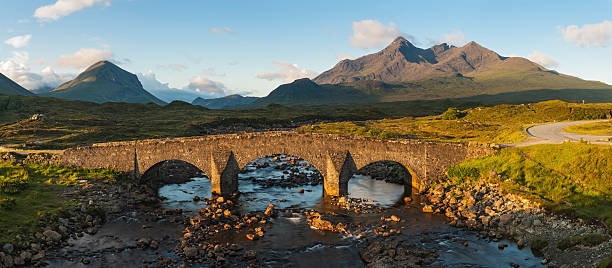 istock Scotland sunrise on ancient bridge Cuillin mountains Skye 155446886