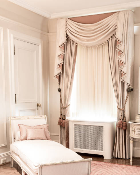 istock Luxury white and beige bedroom with single bed and curtains 155446926