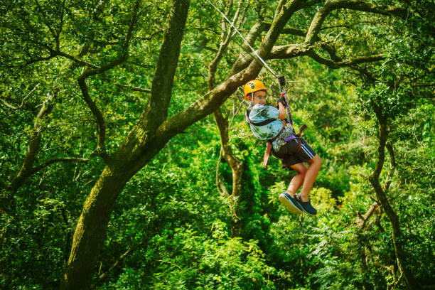 istock kid during a Canopy Tour in Costa Rica 155447337