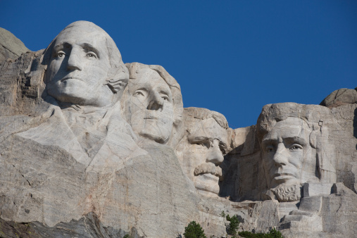 Mount Rushmore National Monument with clear blue skies in South Dakota.
