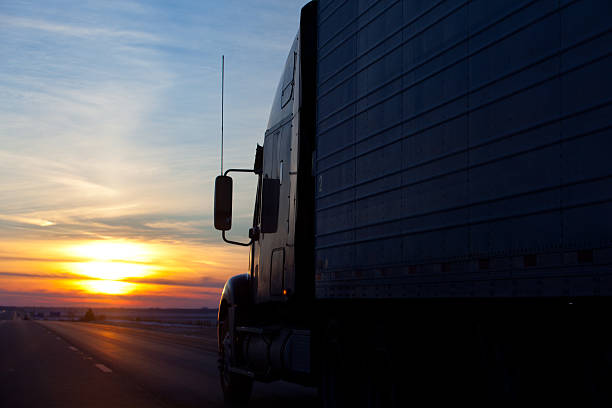 istock Truck on the highway at sunset 155449299