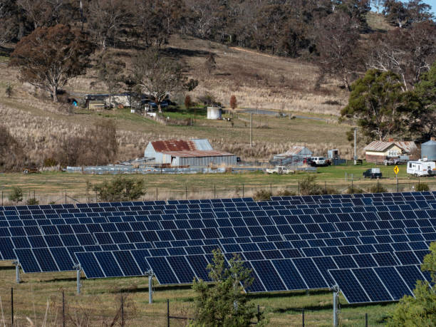 istock Solar farm and rural sheds 1554499532