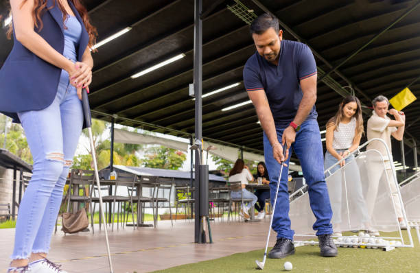 istock Man ready to hit golf ball 1554505951