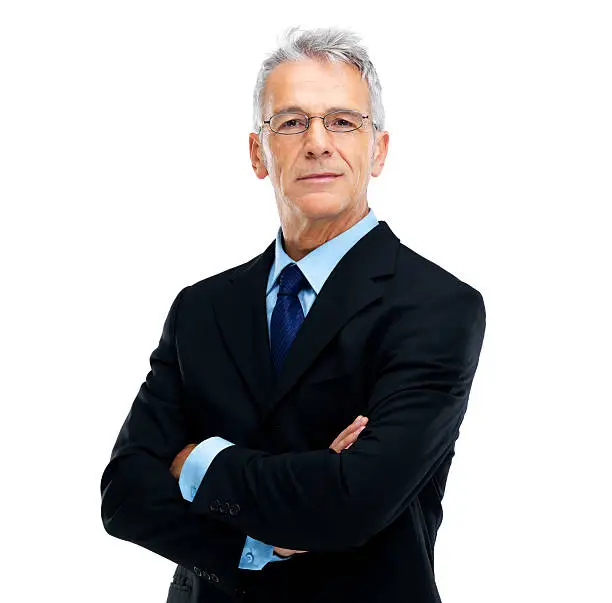 Portrait of a confident senior businessman with arms crossed while isolated on white background