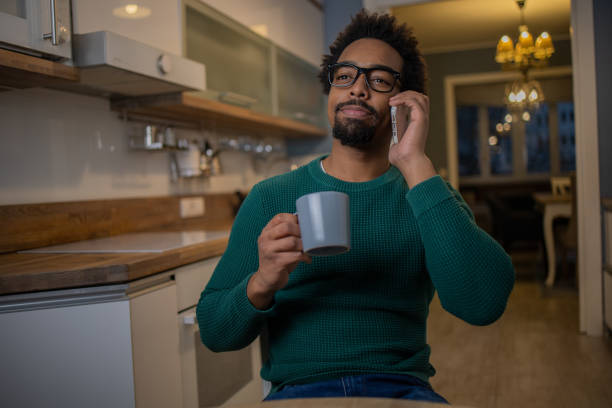 istock Portrait of a young man using smartphone 1554523651