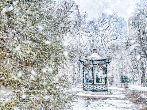 Center city Philadelphia. Rittenhouse Square park in the winter, covered with snow.