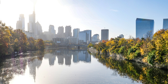 Center city Philadelphia. Autumn. Schuylkill river with colorful trees. Skyline with reflection.
