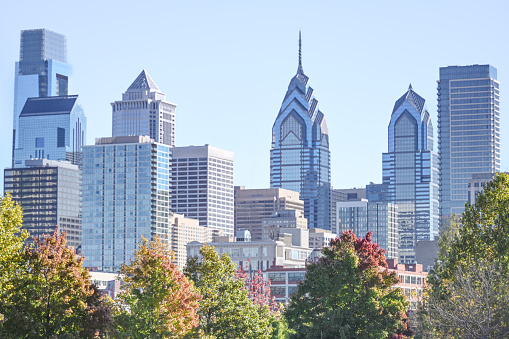 Center city Philadelphia. City skyline with trees in in early autumn colours.