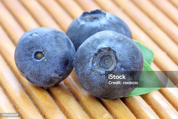 Bilberry Blueberries A Wooden Pad Stock Photo - Download Image Now - Antioxidant, Backgrounds, Berry Fruit