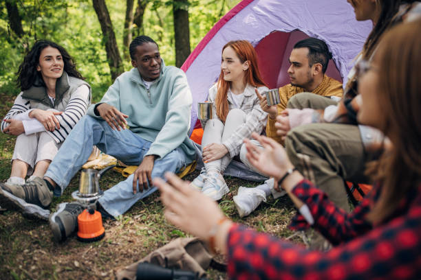 istock Friends camping in nature 1554605180