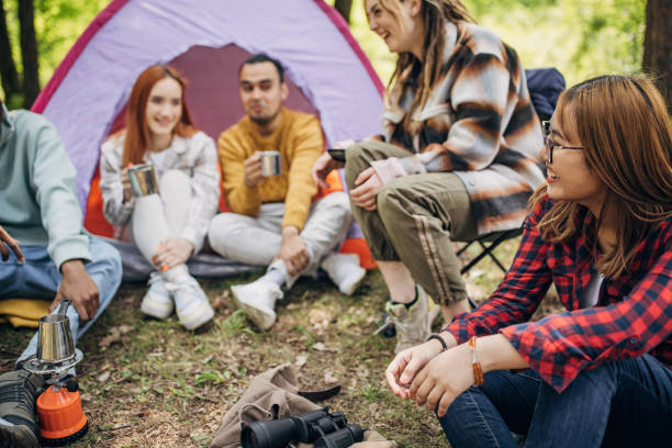 istock Friends camping in nature 1554605582