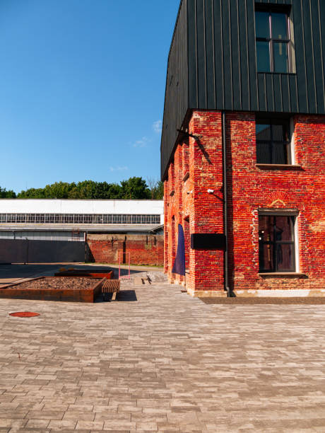 istock Modern cafe workspace exterior loft style red brick wall Old industrial buildings renovation Urban space Break-out areas 1554628257
