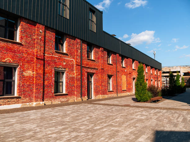 istock Modern cafe workspace exterior loft style red brick wall Old industrial buildings renovation Urban space Break-out areas 1554628264