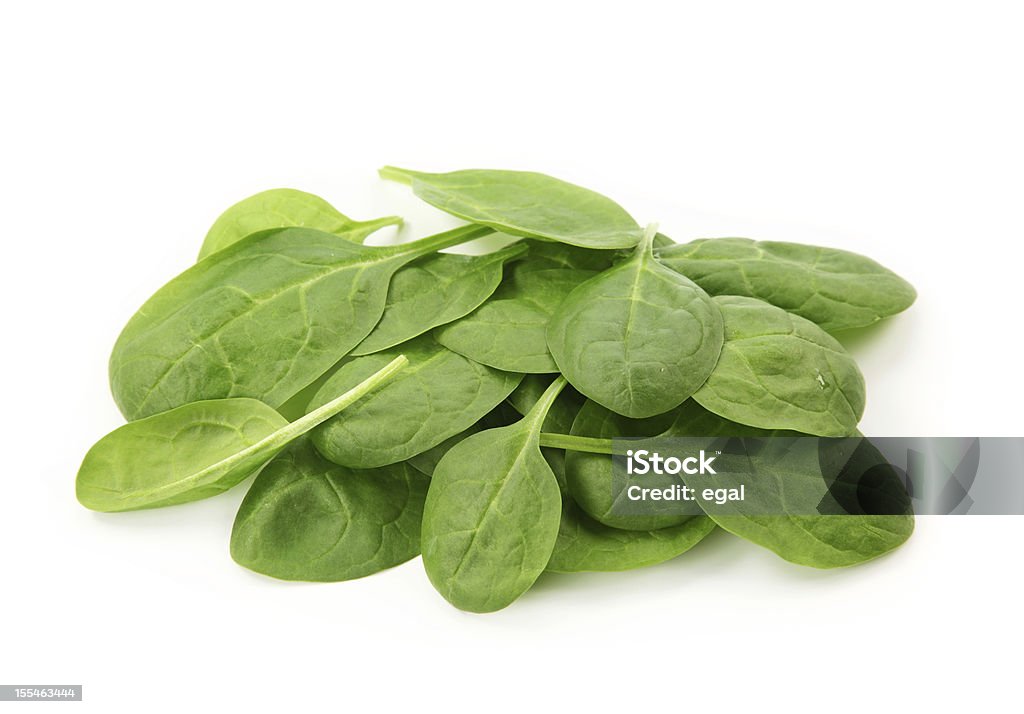 Baby spinach leaves Baby spinach leaves isolated on white background Close-up Stock Photo