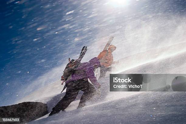 Two Back Country Riders Breaking A Trail Upwards Stock Photo - Download Image Now - Storm, Mountain, Blizzard