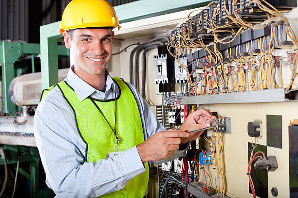 istock technician repairing industrial machine 155467479