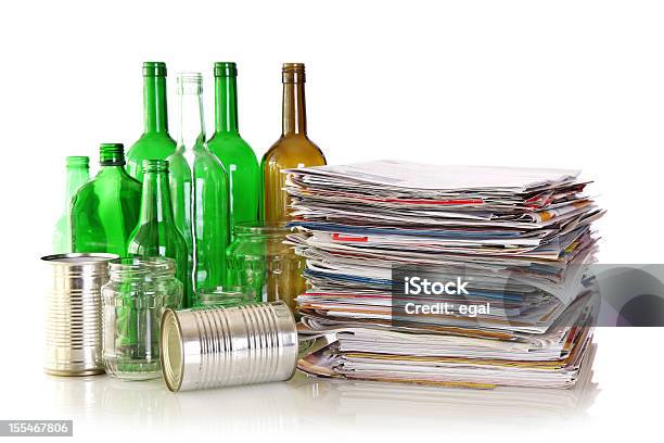 Glass Bottles Metal Cans And Newspapers Stock Photo - Download Image Now - Recycling, Variation, Bottle