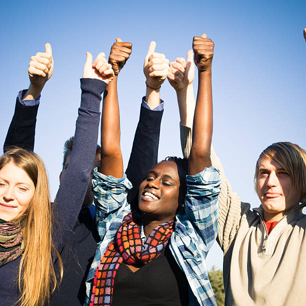 istock Group multiracial friends showing thumbs-up 155469182