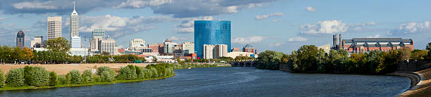 Indianapolis Indiana (panoramic) Panoramic view of downtown Indianapolis, Indiana skyline from the White River. indianapolis photos stock pictures, royalty-free photos & images