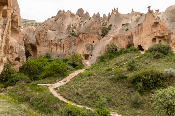Travel destination concept: The Zelve Monastery is a Byzantine-era monastery that was carved into the rock in pre-iconoclastic times. It is part of the Zelve Open Air Museum, located between Ürgüp and Avanos, Turkey. Beautiful high quality photos taking in snow