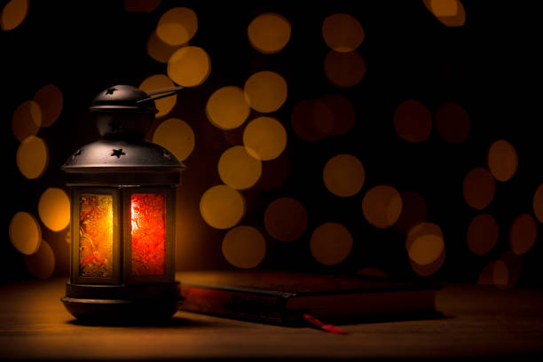 istock Al Quran and a beautiful Arabian lamp 1554769672