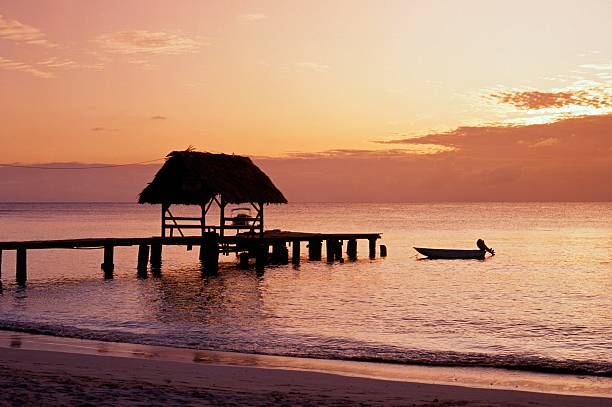 Beautiful sunset at Pigeon Point, Tobago Sunset at Pigeon Point, Tobago, Trinidad and Tobago, Caibbean, West Indies. tobago stock pictures, royalty-free photos & images