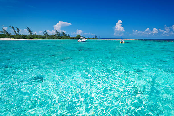 istock Snorkeling boat on turquise Caribbean Sea 155483024