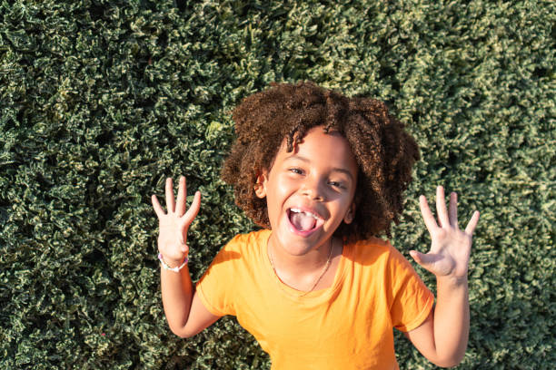 Little Girl Portrait At Outdoors At Daytime