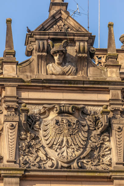 istock Coat of arms on the post office in Nysa. 1554852513
