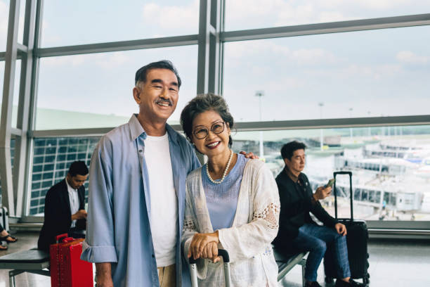 istock Happy senior couple going for vacation 1554867941