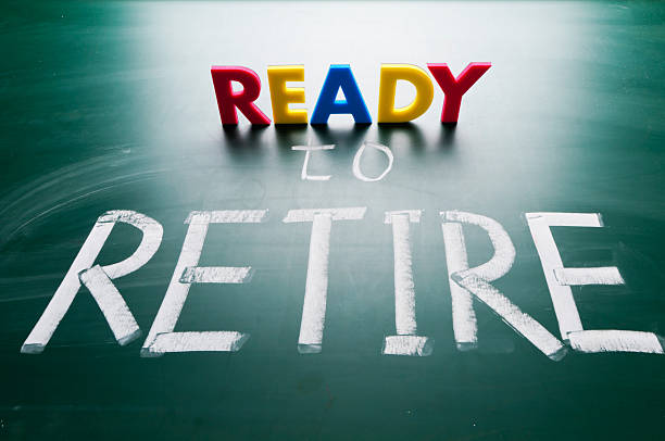 istock Ready to retire, conceptual words on blackboard. 155490455
