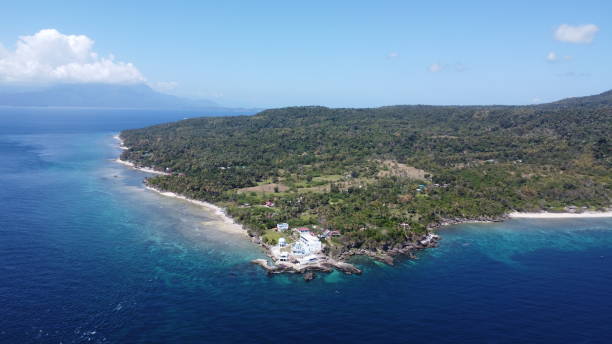 istock Rocky coast of a tropical island. 1554920427