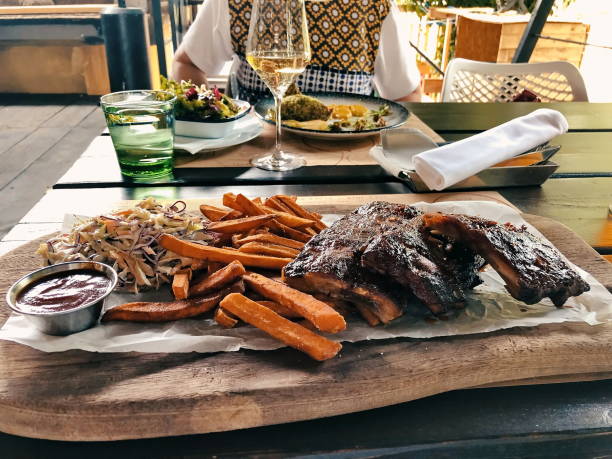istock Barbecue ribs with French fries 1554923146