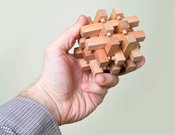 istock Wooden puzzle in hand 155492352