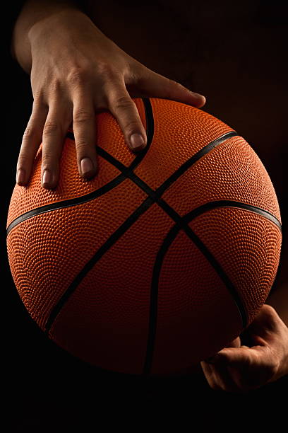 istock Basketball ball in male hands 155492824