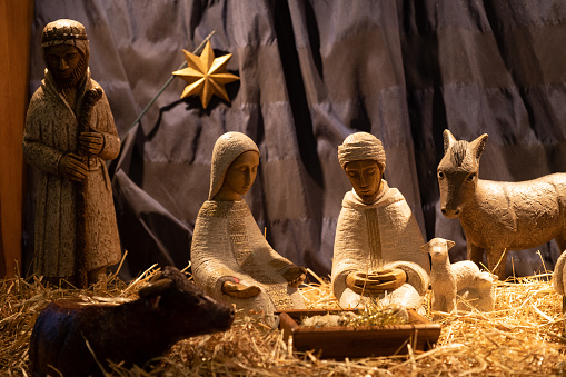 Christmas Manger scene with figurines including Jesus, Mary, Joseph, sheep and magi