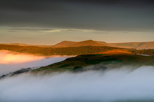 an early morning cloud inversion covers Hope Valley in the Peak District