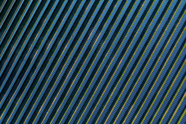 Blue solar panels top down view stock photo