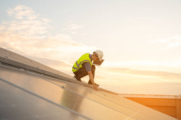 istock Engineering team working on checking and maintenance in solar power plant. 1555034337