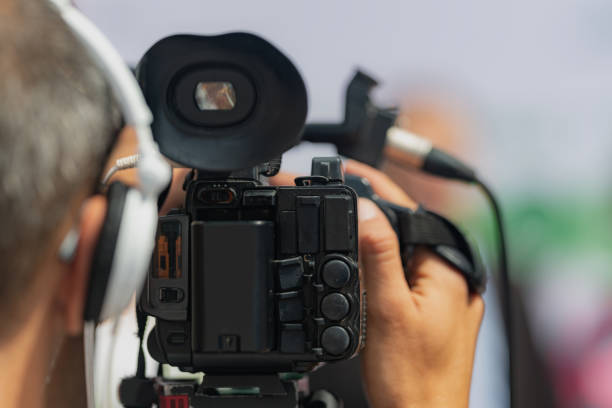 istock Media Spotlight: Cameraman Captures Green Agenda Press Conference 1555045274