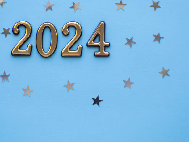 istock 2024 on blue background with silver stars 1555054753