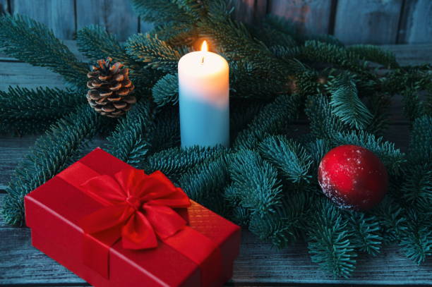 istock Decorated branch and Christmas gift 1555058414