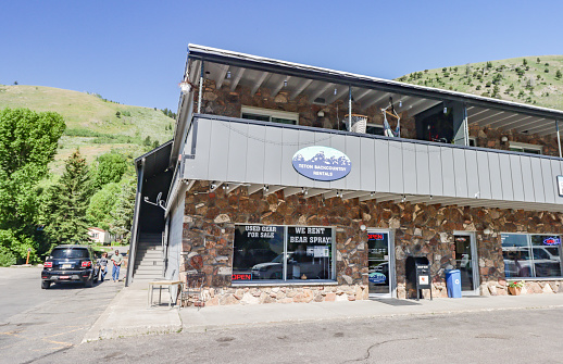 People seen in the background near Teton Backcountry Rentals & Bear Aware on North Cache Street at Jackson of Jackson Hole in Teton County, Wyoming