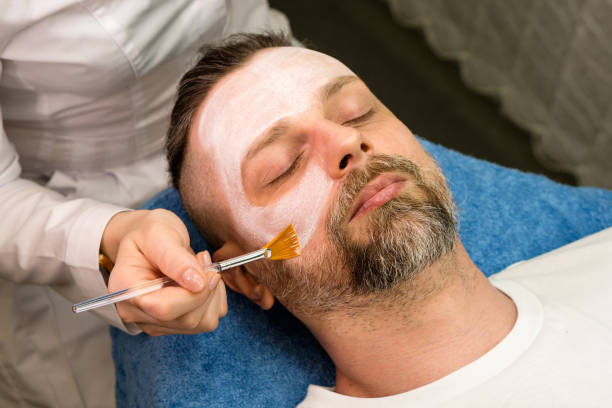 istock Facial cosmetic mask for man 1555133539