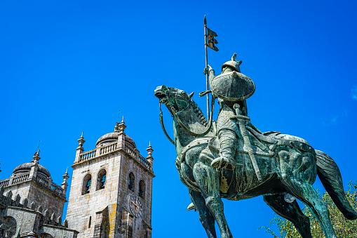 Statue of Vímara Peres and Porto Cathedral, Portugal.