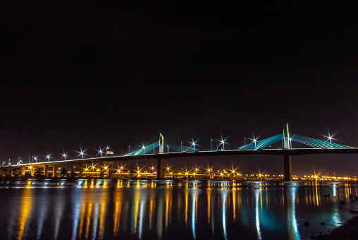 The Rades-La Goulette Bridge illuminates the bay of Tunis with its nighttime splendor. Tunis Tunisie