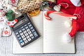 New Year's layout with calculator, Santa's hat and Christmas decorations