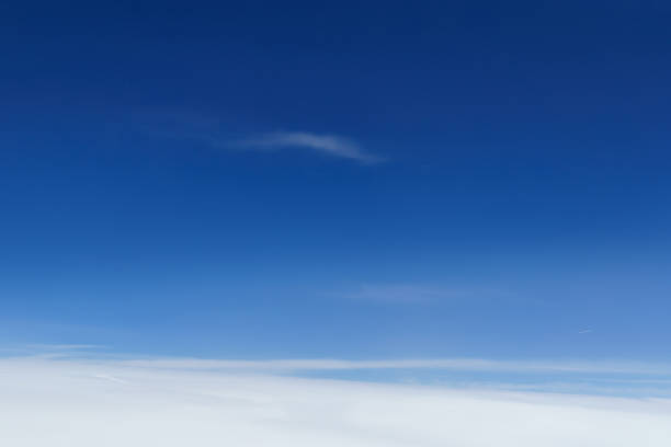 istock beautiful blue sky with soft clouds for abstract background, aerial view 1555169651